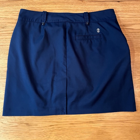 Izod Womens Skort Navy Blue Pockets Golf  Solid Zip Button Front Pleated Hem - Picture 5 of 9